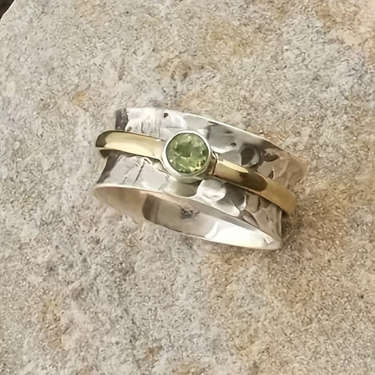 Elegancka obrączka z zielonym cyrkonem